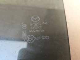 Стекло двери mazda 6 gj  2015-2023 задн. лев.